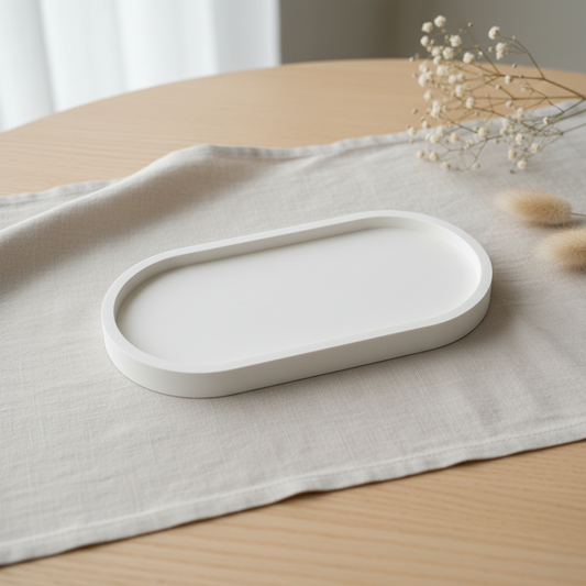 Vassoio ovale in polvere di ceramica dal design minimal, complemento d’arredo ideale come svuotatasche, portagioie, base per candele
